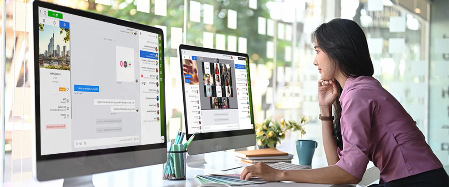 a woman looking at a computer screen